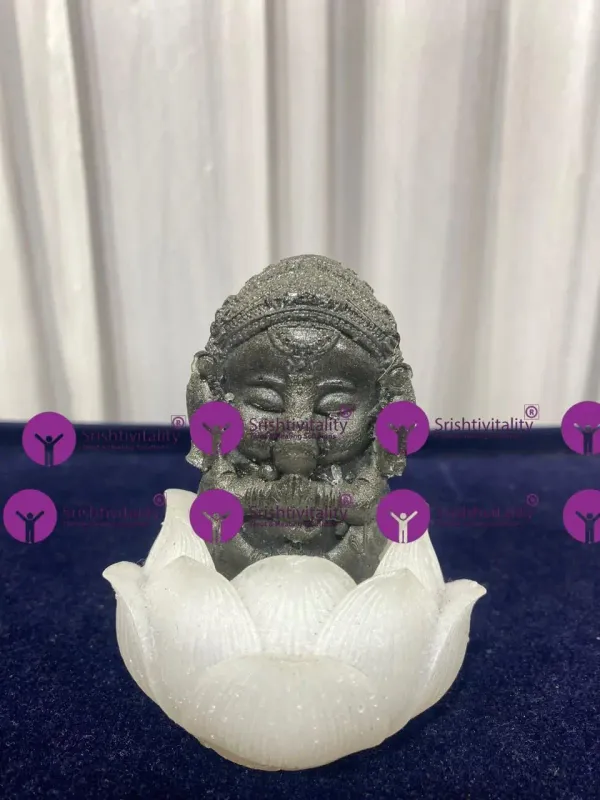 Pyrite Baby Ganesha with Selenite Flower Base